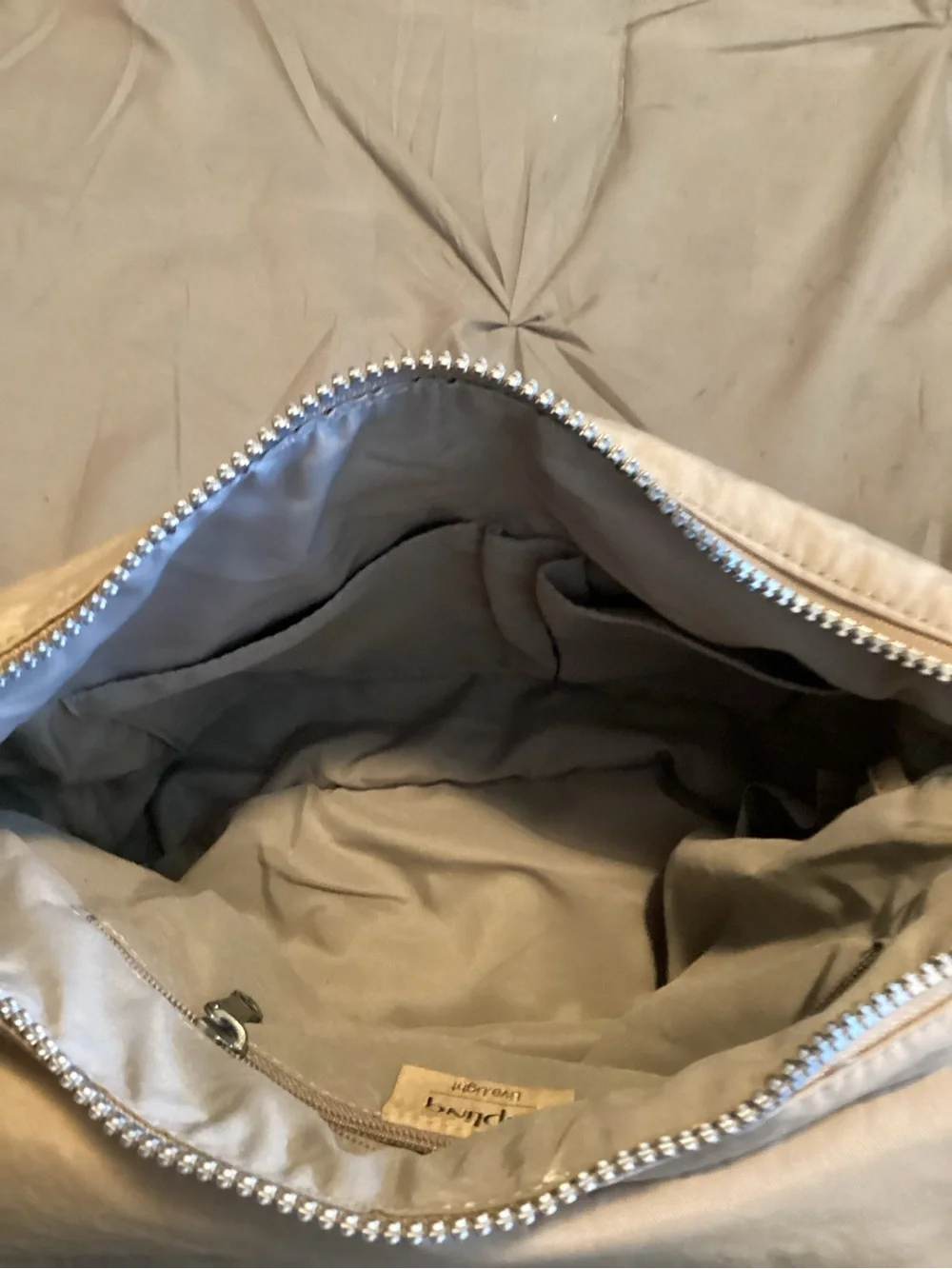 the Kipling tan Rita Messenger crossbody bag